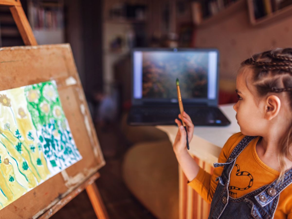 girl following a painting tutorial