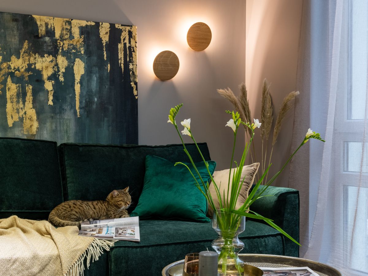 green and gold artwork in modern living room