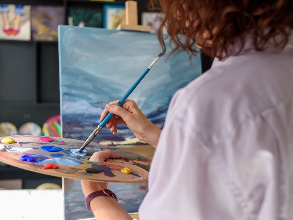 painter working in an art studio